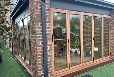 modern-glass-sunroom-with-brick