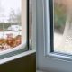 A close-up split image showing two different window issues: on the left, snow accumulation on a window sill with a view of a winter landscape; on the right, condensation heavily fogging a window pane.