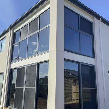 Modern home with large screened sliding doors
